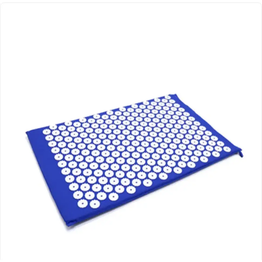 Blue acupressure mat with white circular needles arranged in a grid pattern.