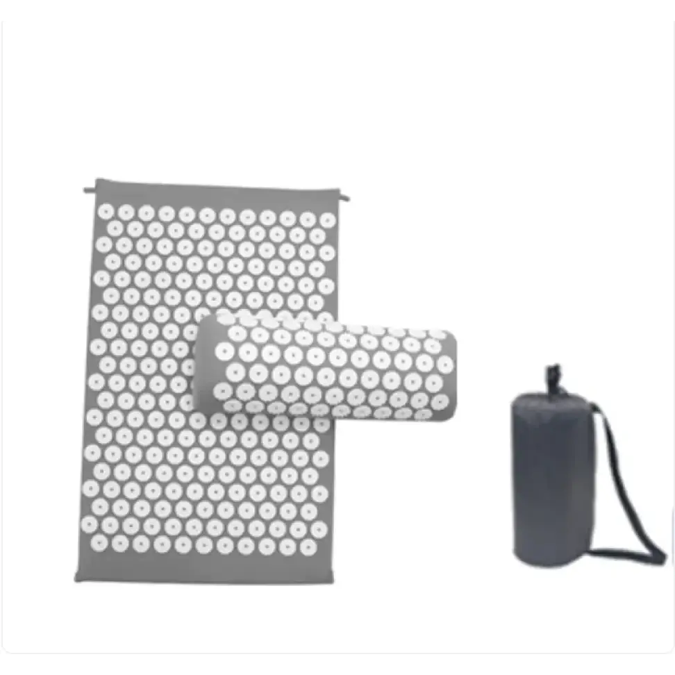 Gray acupressure mat and roller set with white circular needles arranged in a grid pattern.