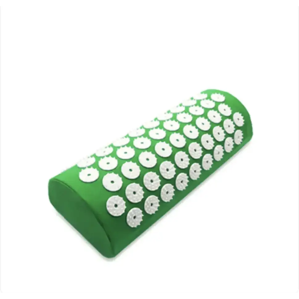 Green cylindrical massage pillow with white, circular acupuncture points embedded across its surface.