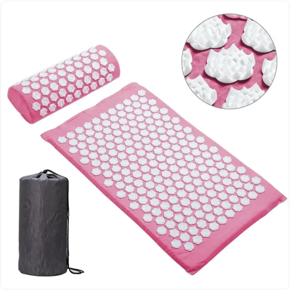 Pink acupressure mat and pillow set with white, flower-shaped spikes.