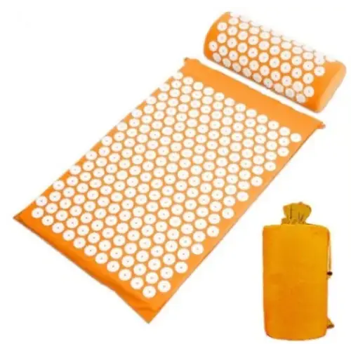 Orange acupressure mat and roller set in a compact carrying bag