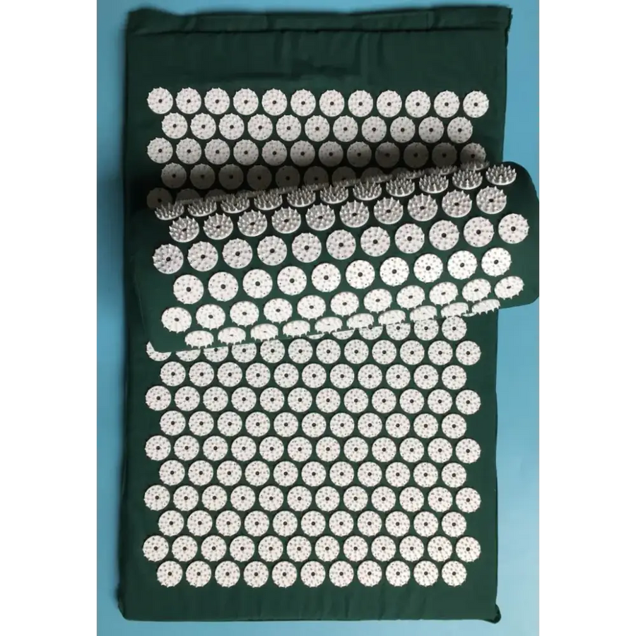 Dark green fabric mat featuring a grid of white, circular acupuncture point mats with raised, spiky protrusions.