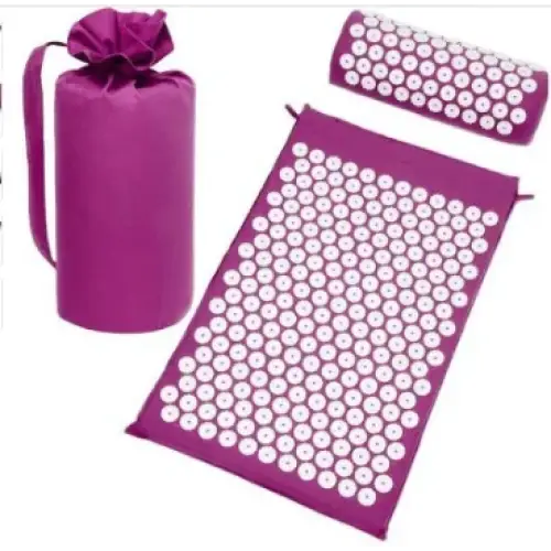 Purple acupressure mat set with white circular needles and matching cylindrical carrying bag.