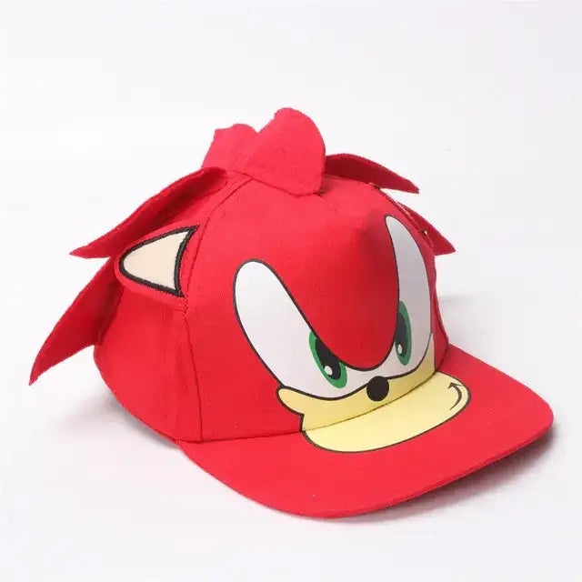 Red snapback cap featuring a detailed embroidered face of the character knuckles from sonic the hedgehog, with green eyes and yellow muzzle.