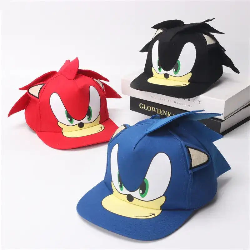 Red, black, and blue sonic the hedgehog baseball caps with embroidered faces and fabric quills.