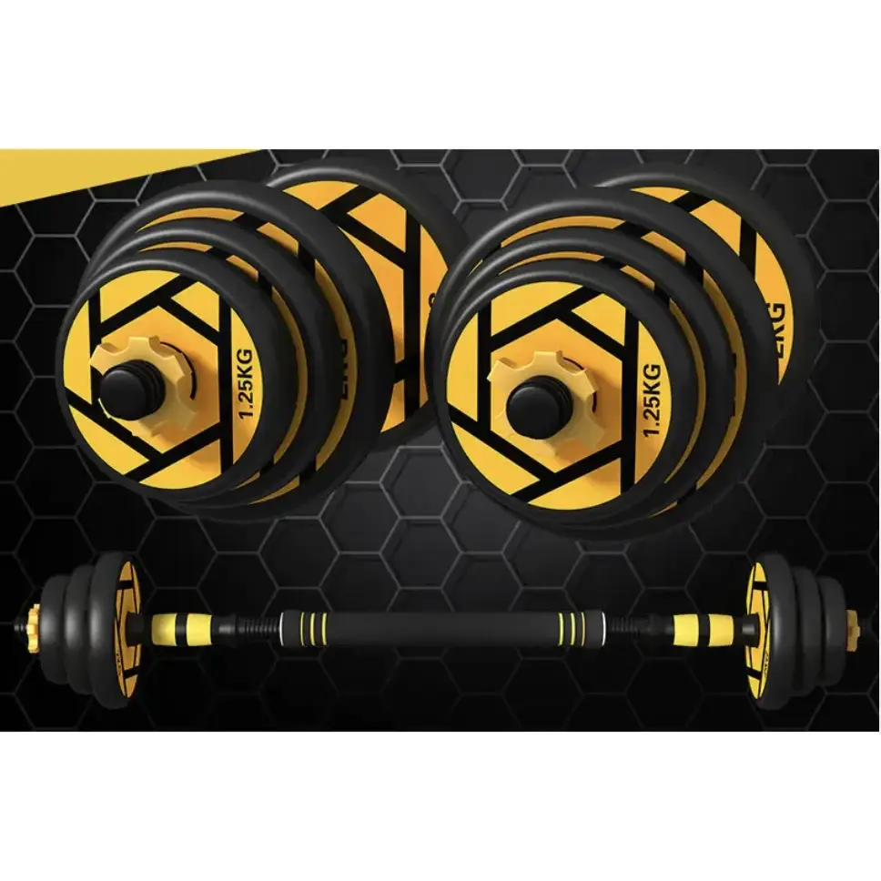 Black and yellow weight plates with geometric patterns, paired with a matching barbell for home gym use.