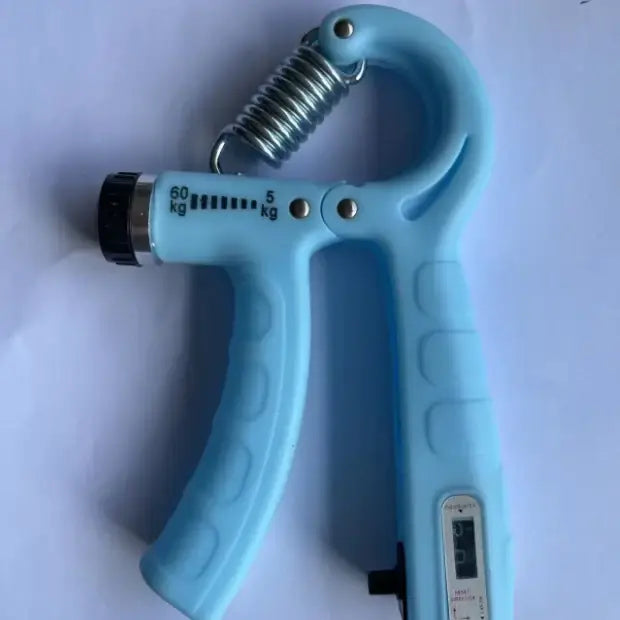 Light blue plastic grip strengthener with a metallic spring and adjustable resistance markings.