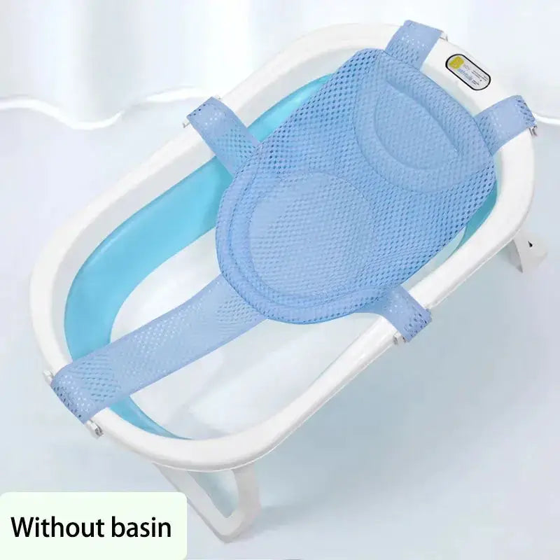 Light blue mesh baby bath support with padded sections and adjustable straps, designed to fit over a foldable bathtub.