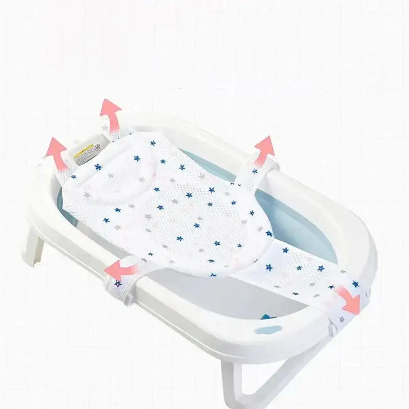 White star-patterned mesh baby bath support with blue and gray stars, designed for safety and comfort in a foldable plastic bathtub.