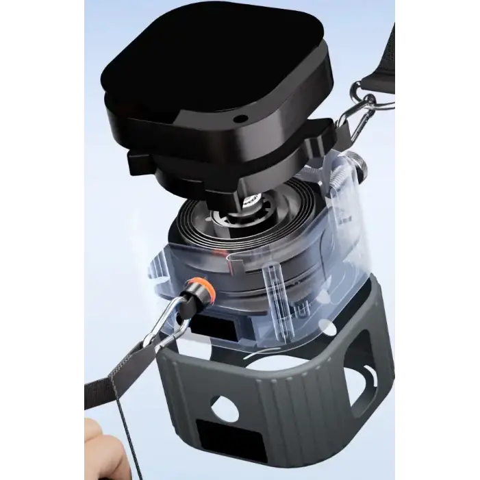 Black portable speaker with transparent casing revealing internal components and a detachable strap.