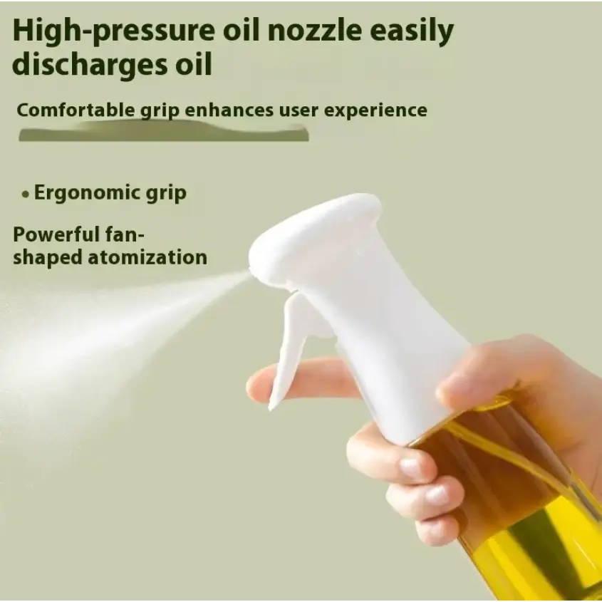 White plastic spray nozzle with ergonomic grip, designed for high-pressure oil discharge and powerful fan-shaped atomization.