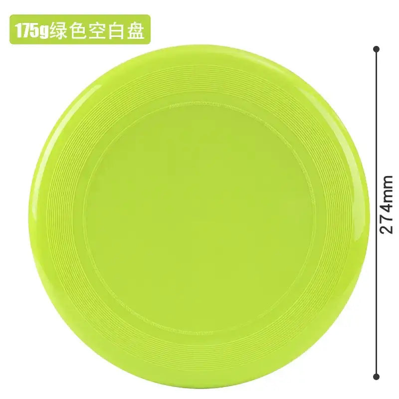 A bright lime green plastic frisbee with a smooth, glossy finish and concentric ridges along its edge.