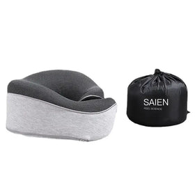 Gray and black memory foam travel pillow with a textured fabric cover, accompanied by its branded storage bag.