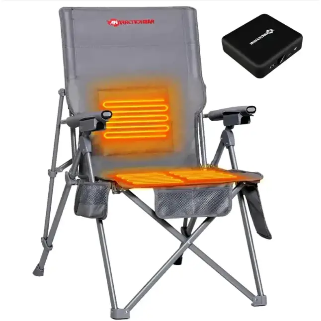 Gray foldable camping chair with integrated orange heating elements on the backrest and seat, featuring a ’polar gear’ logo.