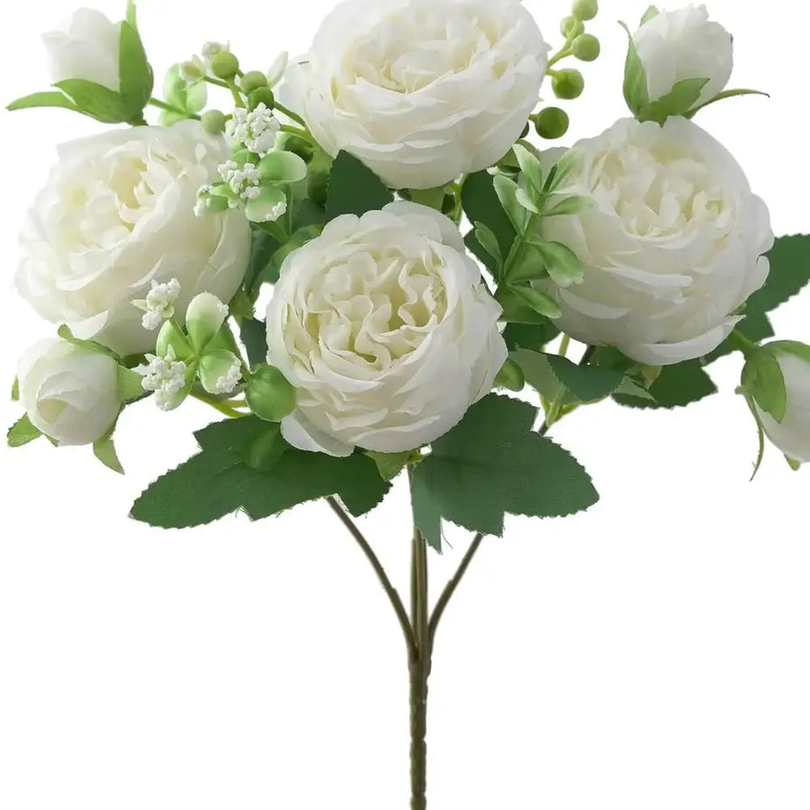 A delicate arrangement of artificial white roses with lush green leaves and buds, crafted from synthetic fabric to mimic the soft texture and natural form of real blooms.