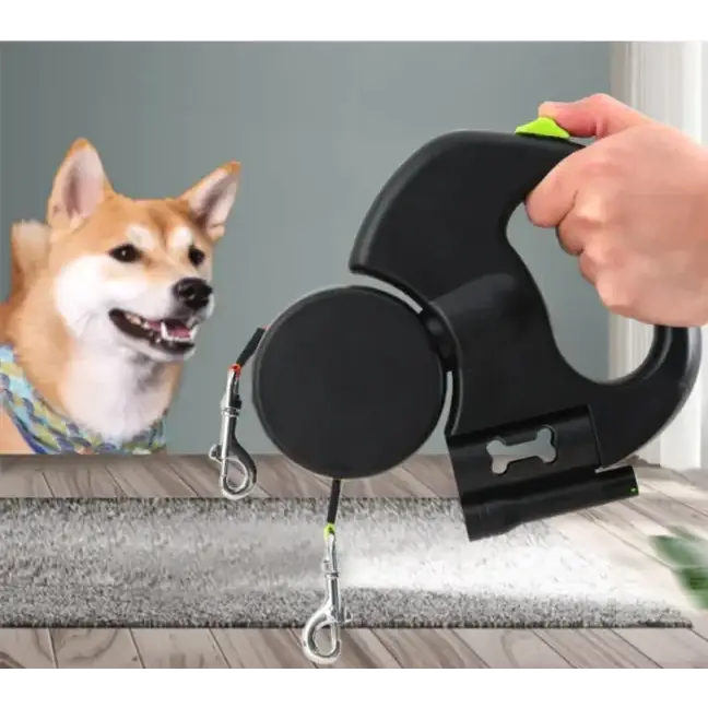 Black retractable dog leash with lime green accent on handle and silver metal clips