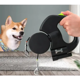 Black retractable dog leash with lime green accent on handle and silver metal clips