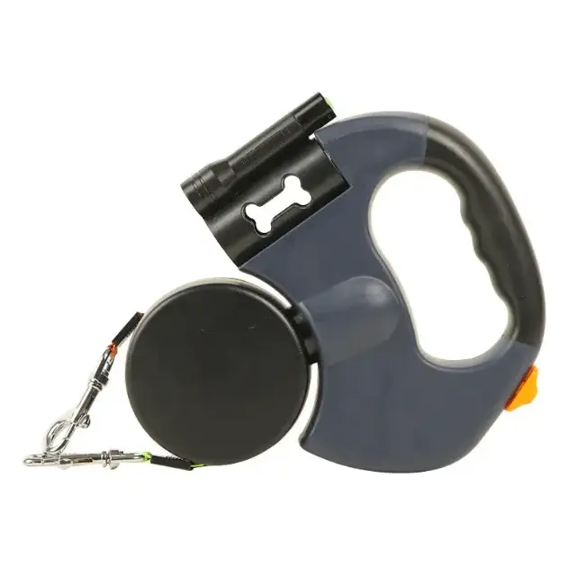 Dark gray retractable dog leash with a built-in black flashlight featuring a bone-shaped cutout and an orange release button.
