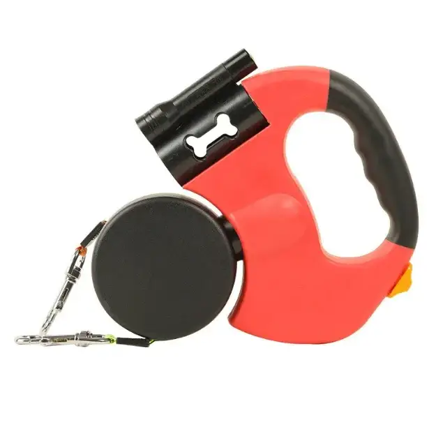 Red and black retractable dog leash with a built-in flashlight featuring a bone-shaped cutout on the handle.