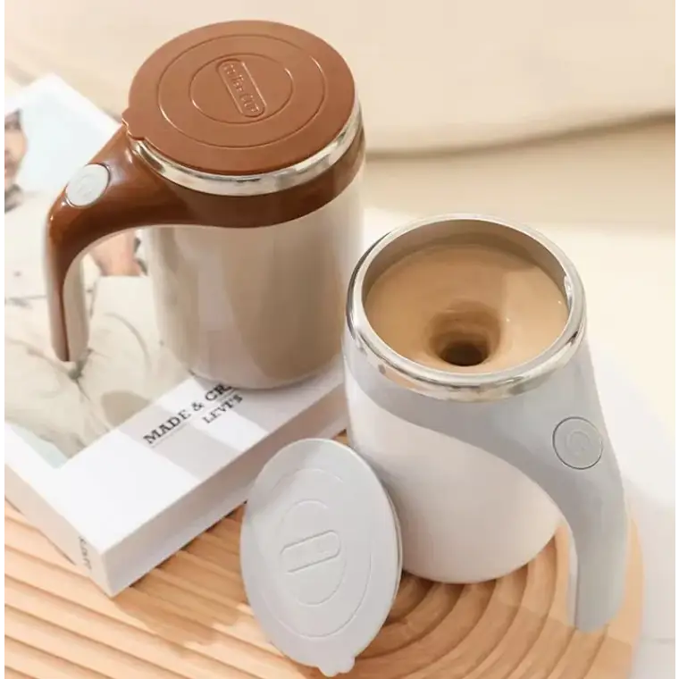 Brown and silver electric mug with a handle, featuring a removable lid.