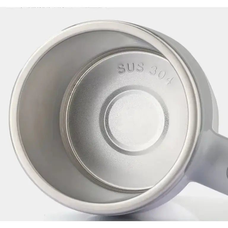 A sleek, stainless steel mug with a matte finish and an embossed ’sus 304’’ marking on its interior base.