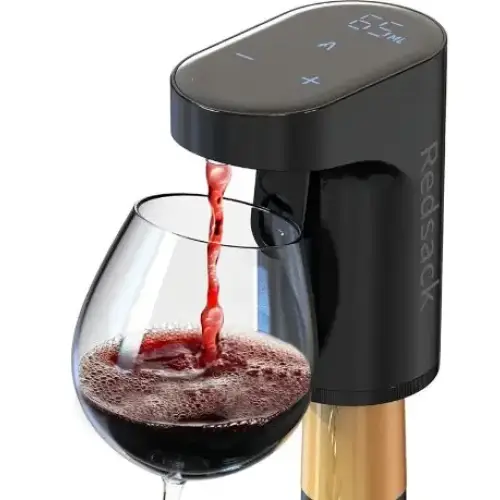 Black redstack wine dispenser with digital display pouring red wine into a glass.