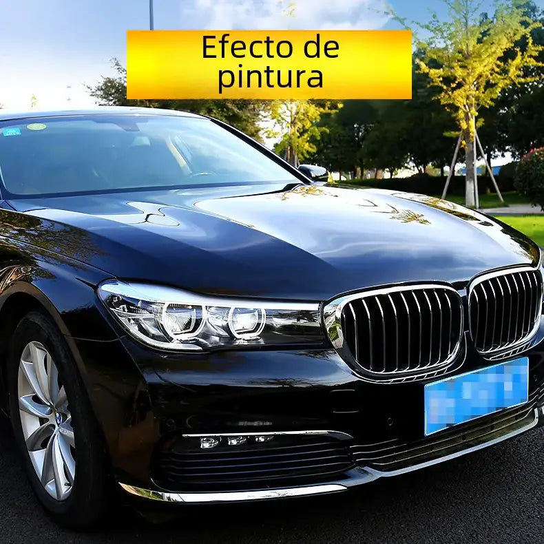 Black bmw sedan with a glossy finish and chrome accents.