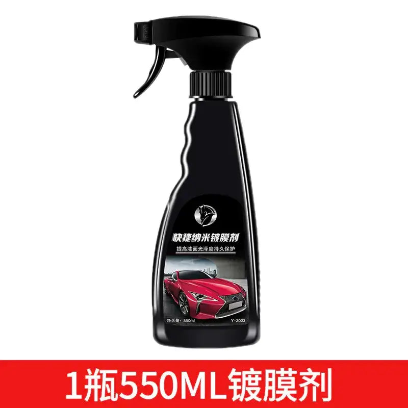 Black spray bottle with a glossy finish and ergonomic contours, featuring chinese text on the label that reads ’快捷纳米镀膜剂’ (quick nano coating agent) above an image of a red lexus sports car.