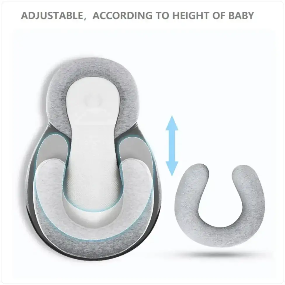 Adjustable gray and white baby sleep positioner with cushioned, contoured design for ergonomic support.