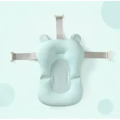 Light blue, soft silicone baby bath support with adjustable straps and ear-like protrusions.