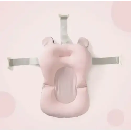Pink inflatable baby bath support with soft, rounded ears and adjustable gray straps.
