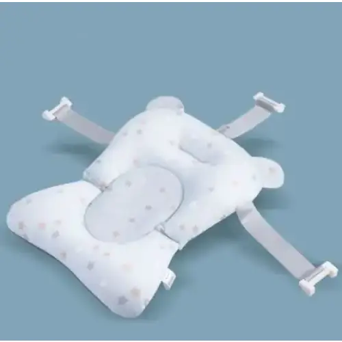 White star-patterned baby bath seat with soft fabric and adjustable straps.