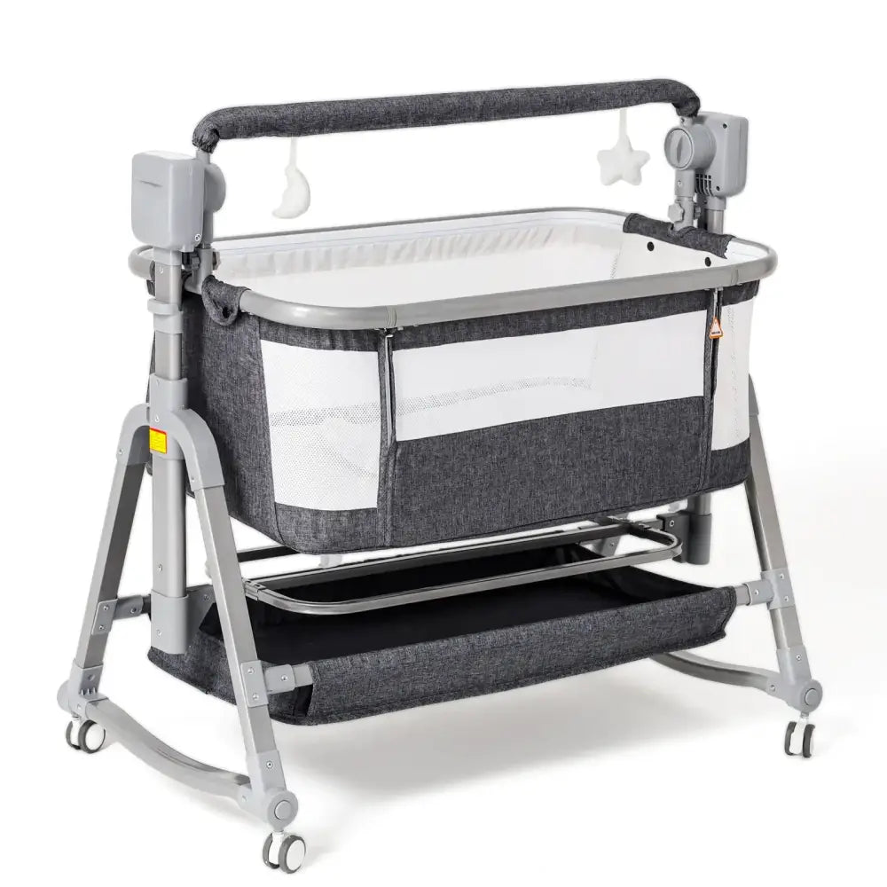 Gray fabric cradle with mesh sides and a white interior, mounted on a gray metal frame with wheels.