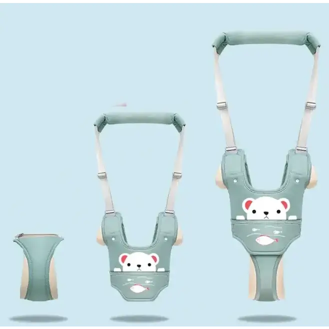 Light green baby walker with white bear face and fish design, featuring adjustable straps and padded shoulder supports.