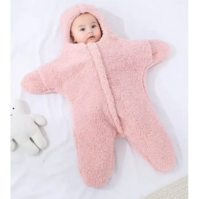 Pink star-shaped baby sleeper made of soft, plush fleece material.
