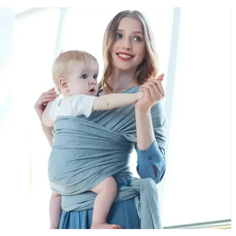 Light blue woven fabric baby wrap.