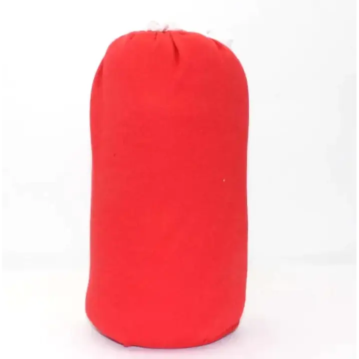 Red fabric sleeping bag compression sack.