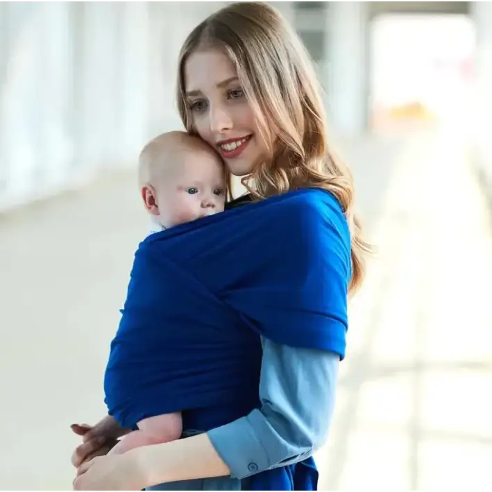 Blue woven fabric baby carrier