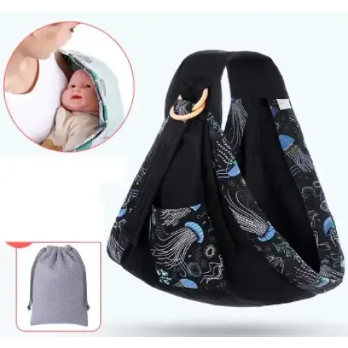 Black baby sling with a blue and gray jellyfish pattern, featuring adjustable straps and a wooden ring for secure carrying.