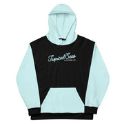 A black and light blue color-blocked hoodie with a white cursive ’tropical seas’ logo on the chest.