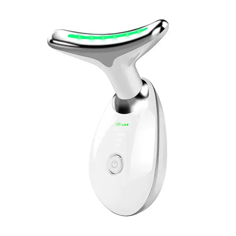 Silver and white facial slimming device with a curved, glowing green led strip along the top.