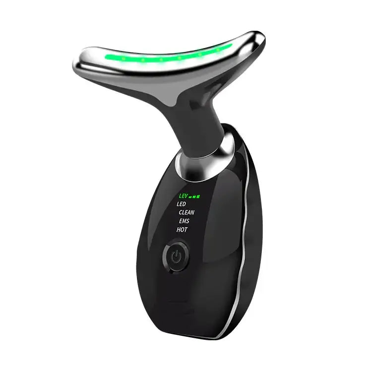Black and silver facial slimming device with a curved, glowing green led strip at the top.