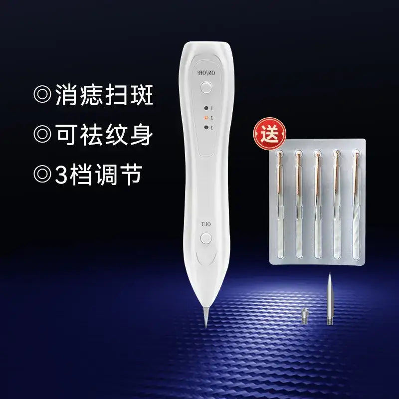 White handheld laser tattoo removal device with interchangeable metallic tips.