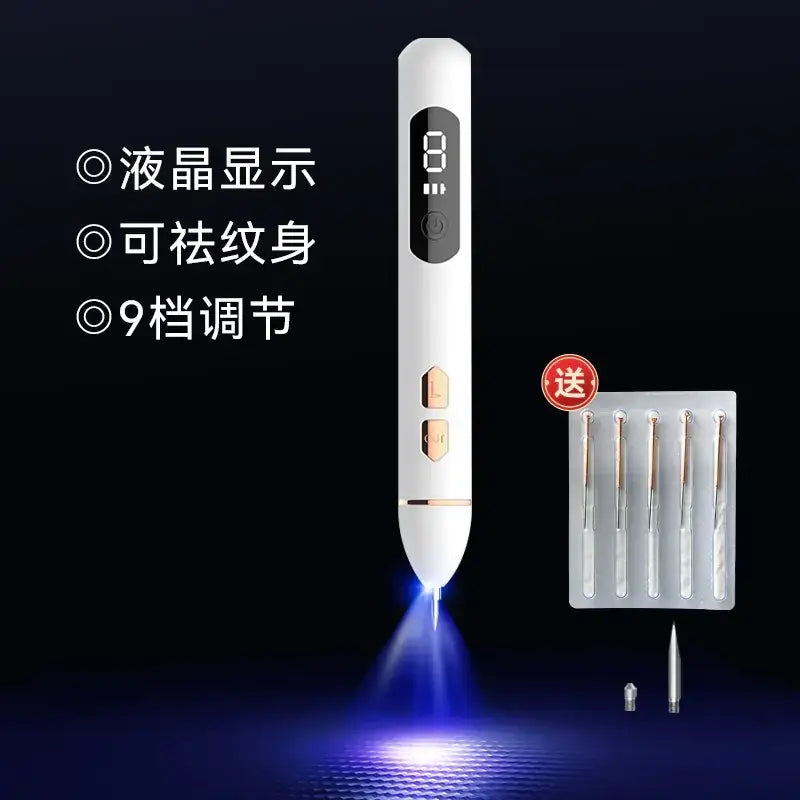 White handheld device with digital display and gold-tone buttons, emitting a blue light from its tip.