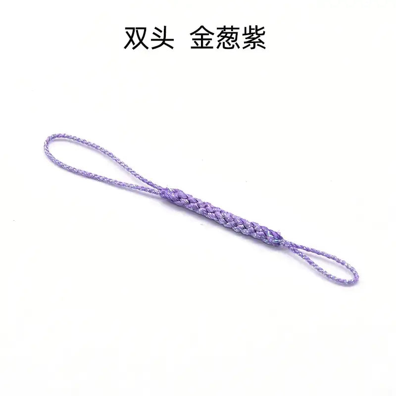 A delicate lavender-colored braided cord with a double-ended loop design, crafted from fine synthetic fiber.