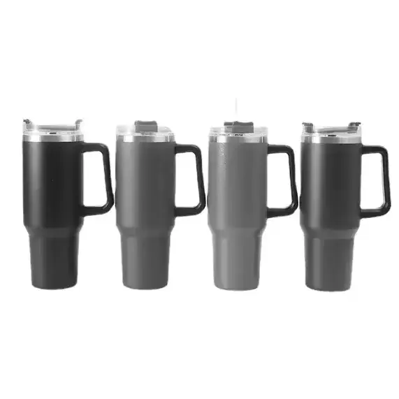 Four insulated travel mugs in matte black and gray, each with a handle and clear lid.