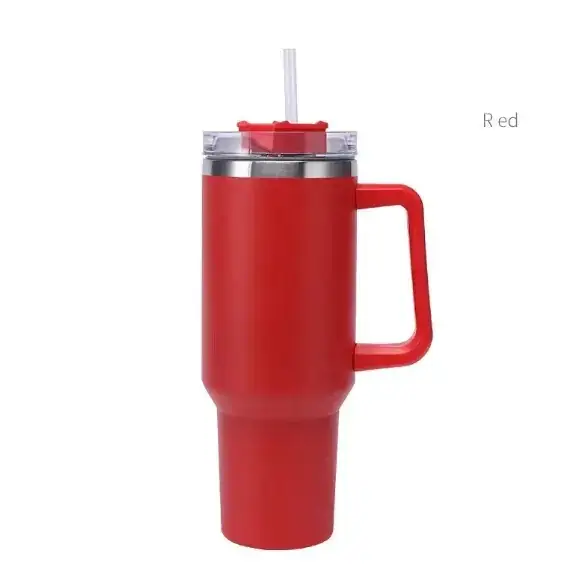 Red insulated tumbler with a handle, clear lid and straw.