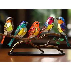 Vibrant stained glass bird figurines perched on a bronze branch, each featuring intricate colorful panels and detailed craftsmanship.