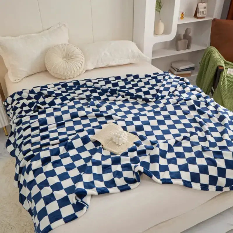 Blue and white checkered plush blanket.