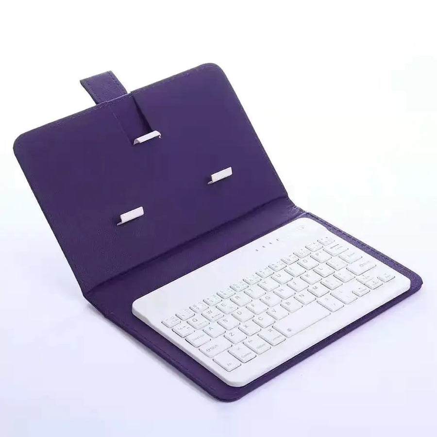 Purple leather tablet case with integrated white keyboard.